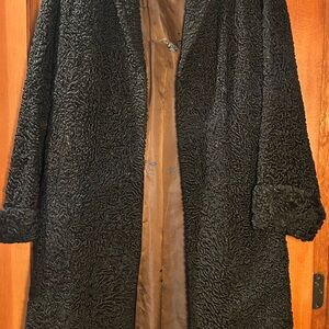 Women’s lamb fur coat black.